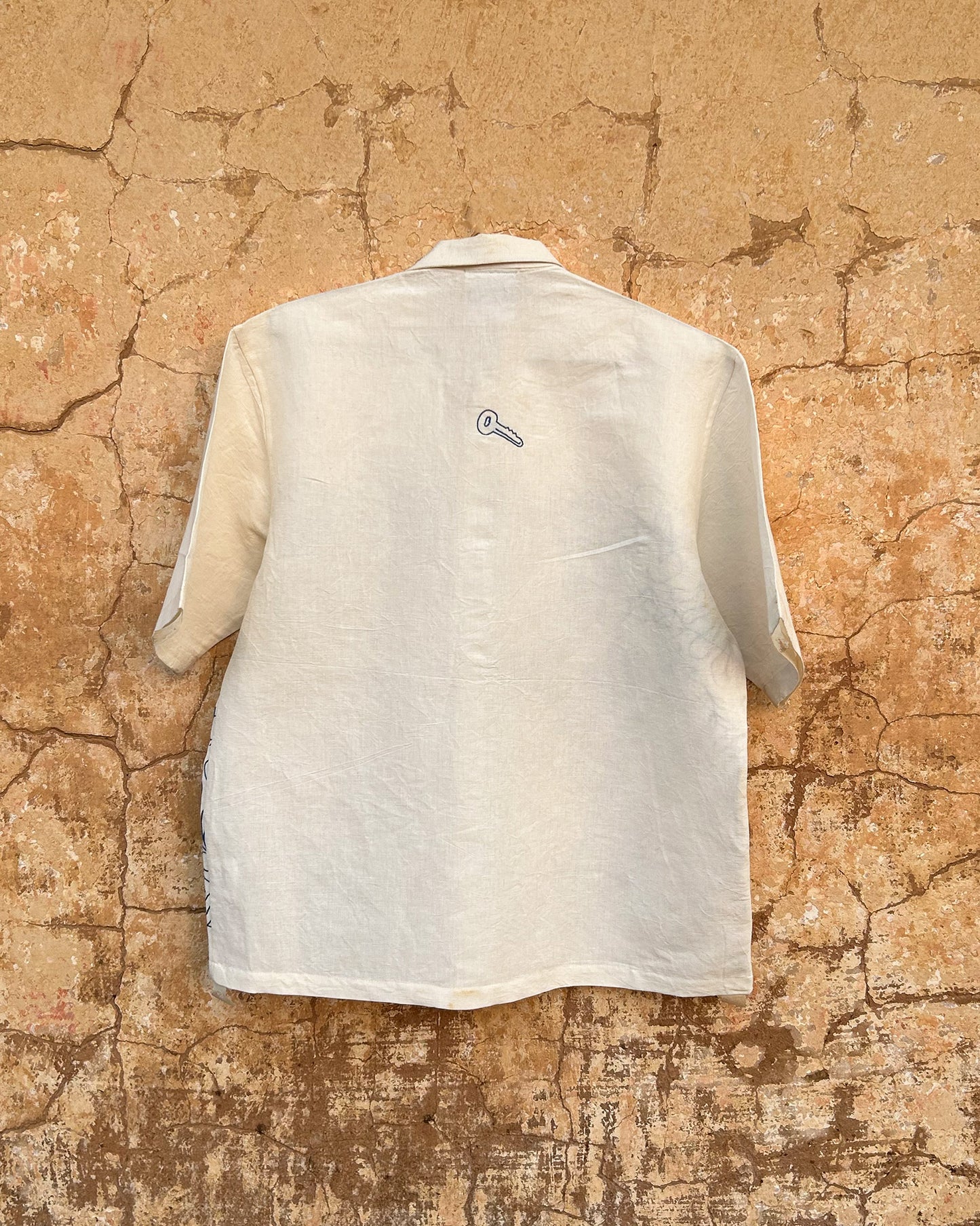 Clearly Confused White Shirt with Blue Embroidery Back