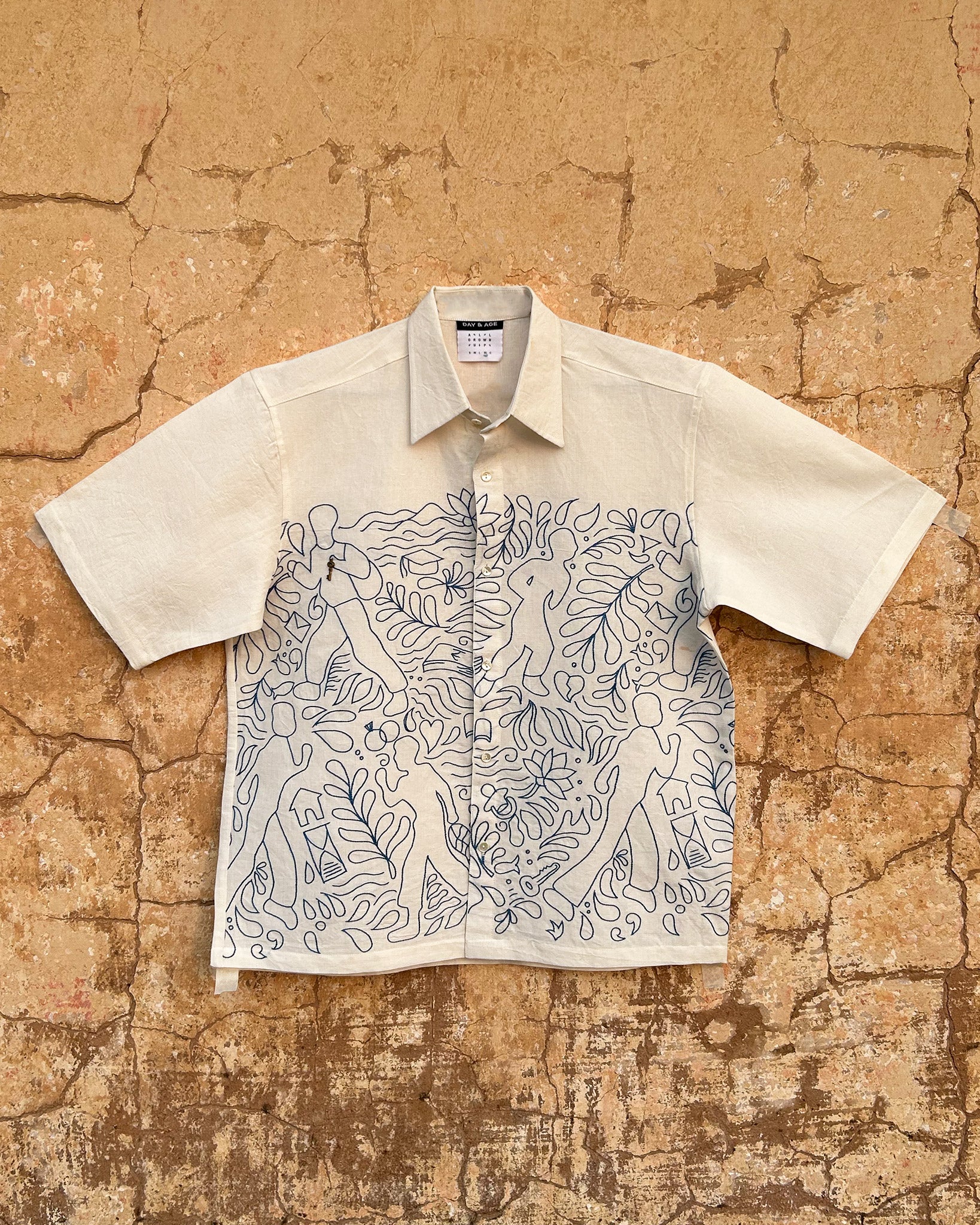 Clearly Confused White Shirt with Blue Embroidery