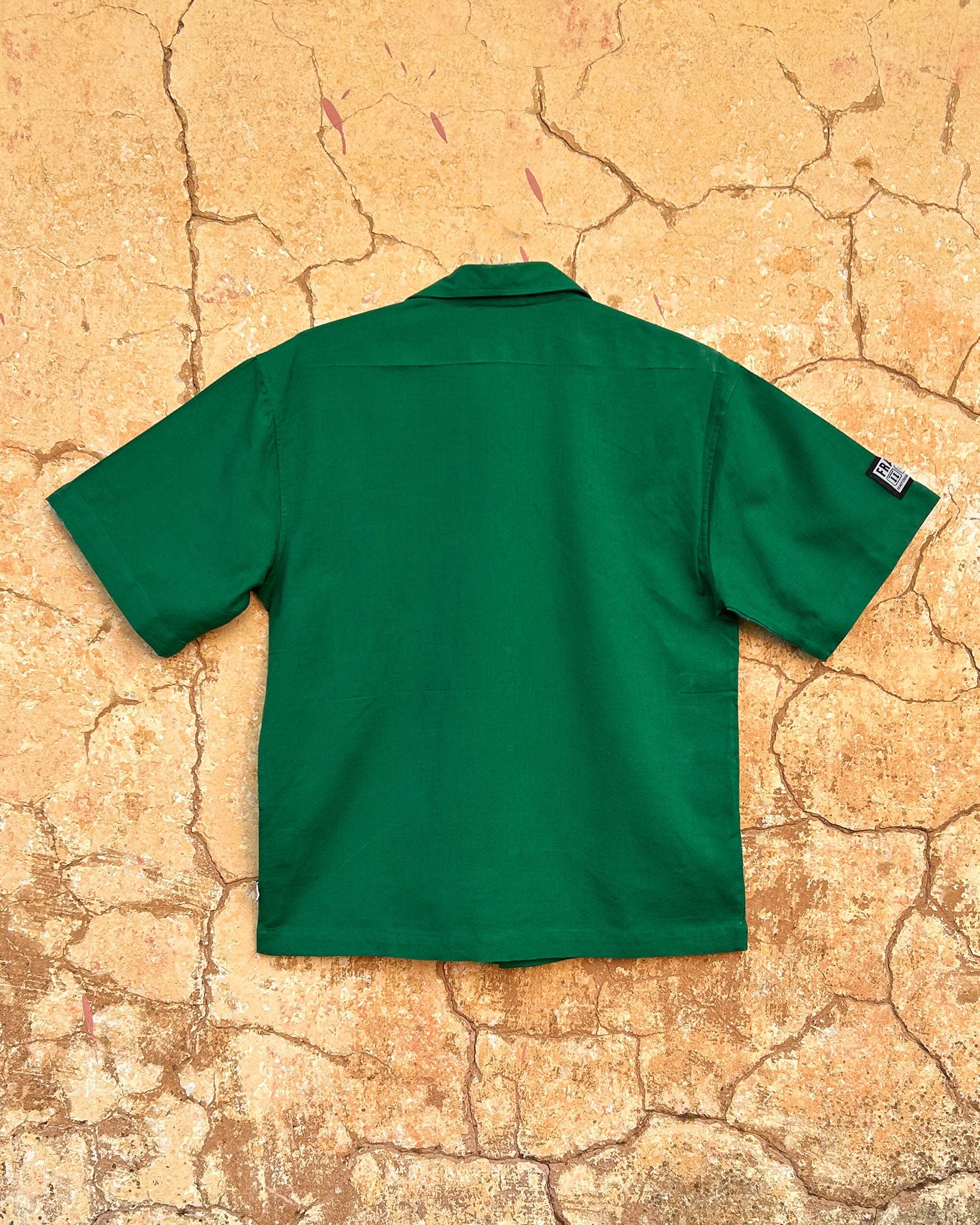 Silent Scream Green Shirt with Pink Embroidered Message Back
