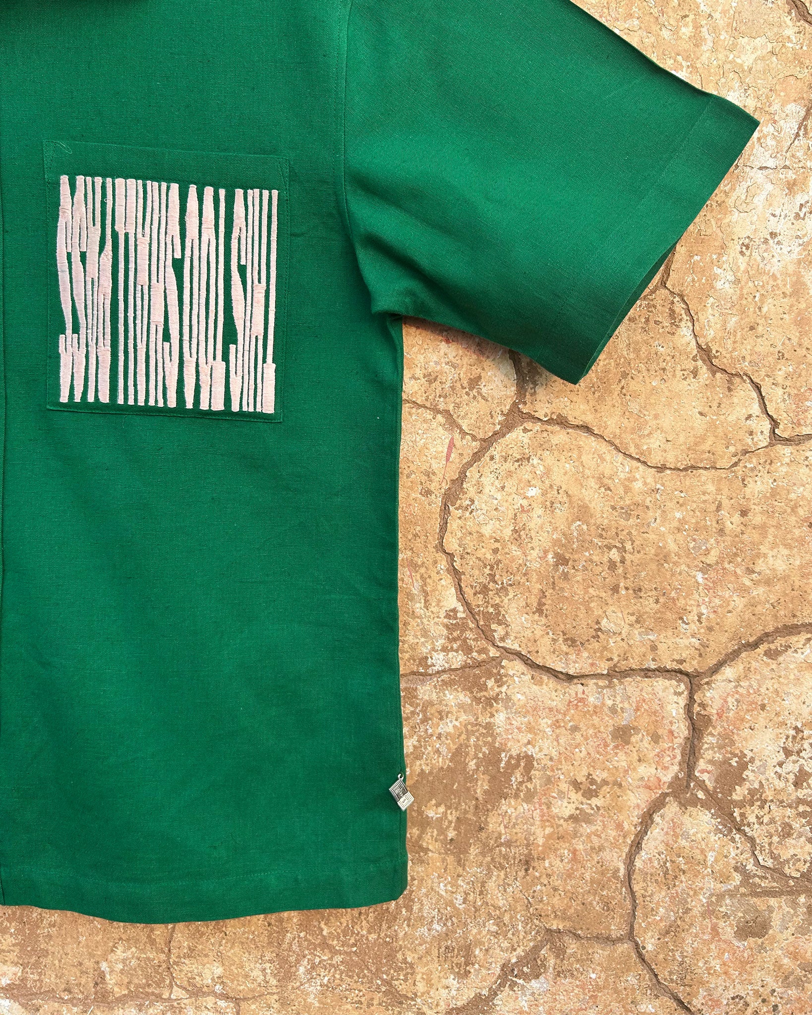 Silent Scream Green Shirt with Pink Embroidered Message Sleeve