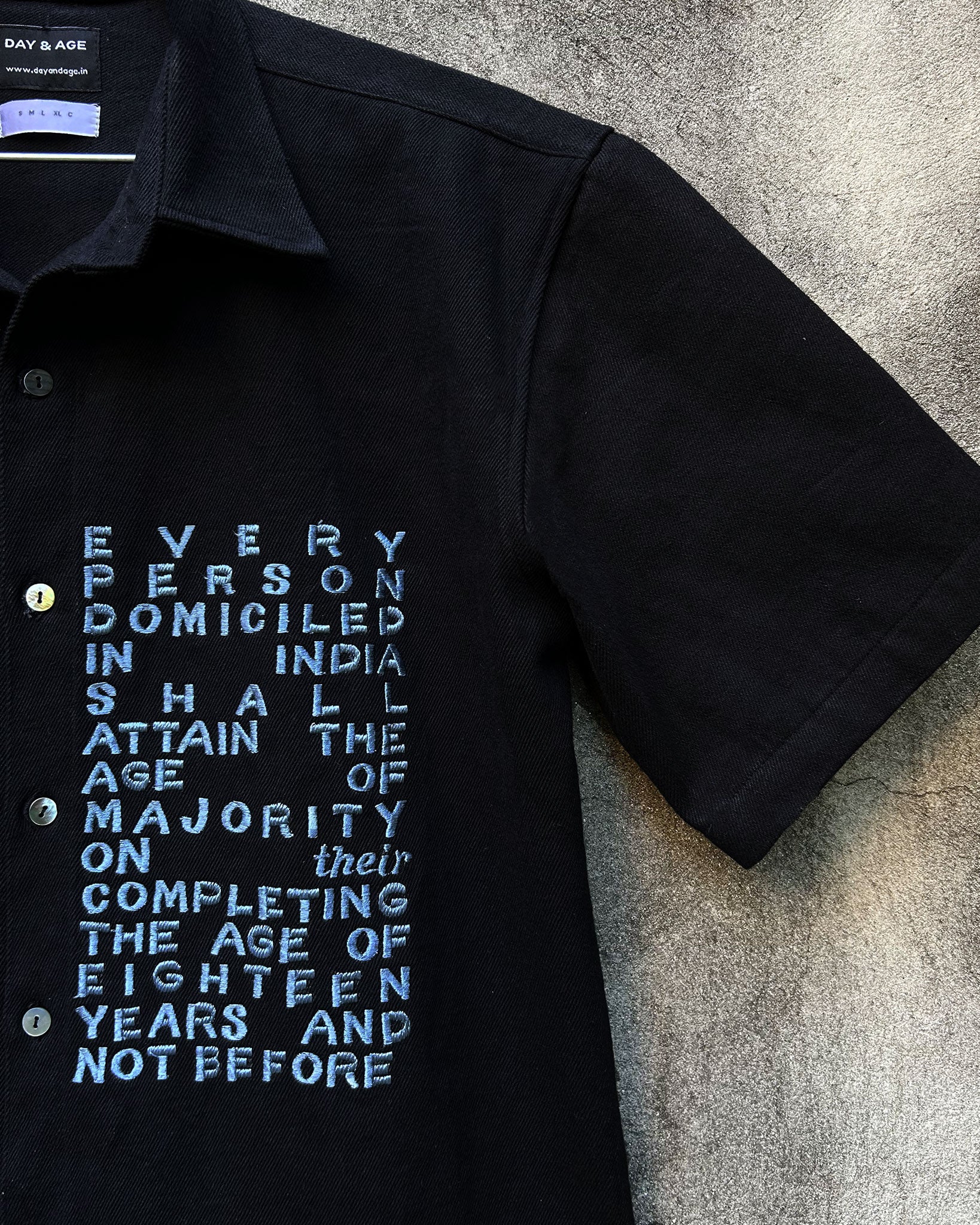 Majority Act Black Shirt with Embroidered Text Sleeve