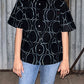 Model wearing Real Illusion Black Shirt with Embroidered Surface